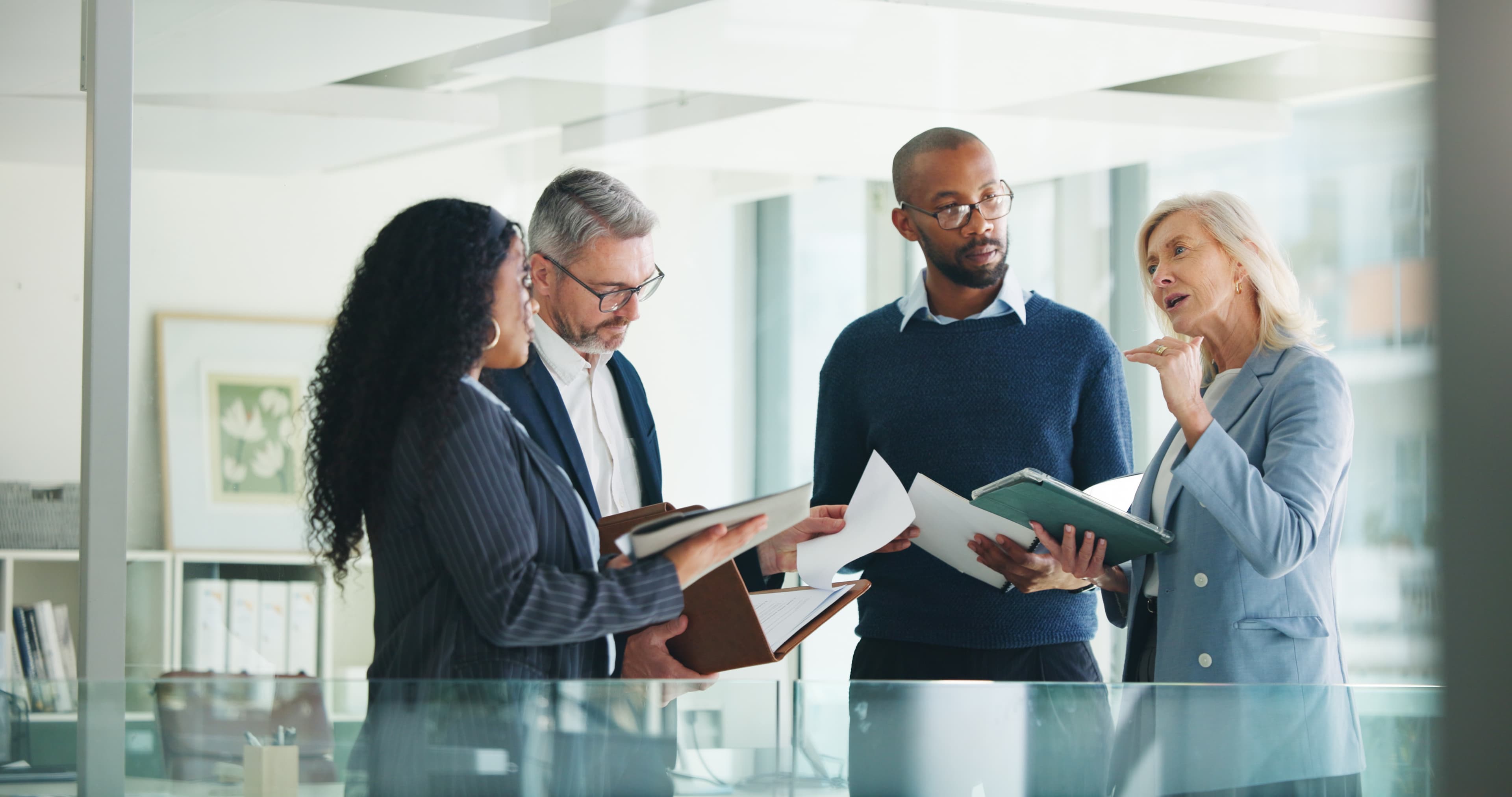 Team reviewing tender documents